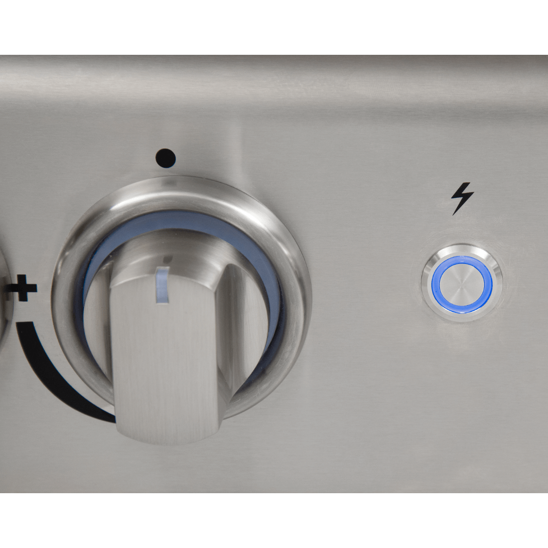 Close-up of Cuisinart Arkton gas grill control knob and ignition button.
