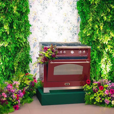 Fogão Lofra Dolcevita Vinho 90cm 5 Bocas Forno Elétrico 102 Litros - fogão de piso vinho com acabamento inox, forno elétrico e puxadores cromados