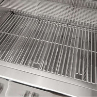 Churrasqueira a Gás Coyote com grelha de inox para churrasco gourmet e alta performance em cozinhas externas.