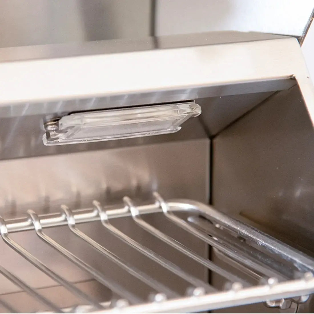 Churrasqueira Evol Modena 34 Inox 3 Queimadores 86cm - detalhe interior inox, grelha e luz, ideal para churrasqueira de embutir