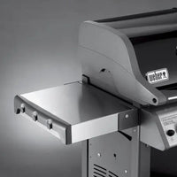 Churrasqueira a Gás Weber 2 Queimadores 120cm com Rodízio Spirit E-210 em inox com bancada lateral, tampa articulada e acabamento polido