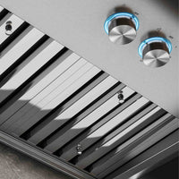 Coifa Bertazzoni Calabria Parede Inox 122cm em inox escovado com filtros baffle, botões cromados iluminados e duto embutido