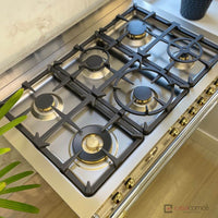 Fogão Bertazzoni Heritage Marfim 90cm 6 Bocas Forno Elétrico 103L fogão de piso em inox com 6 bocas, grelhas em ferro fundido e botões dourados
