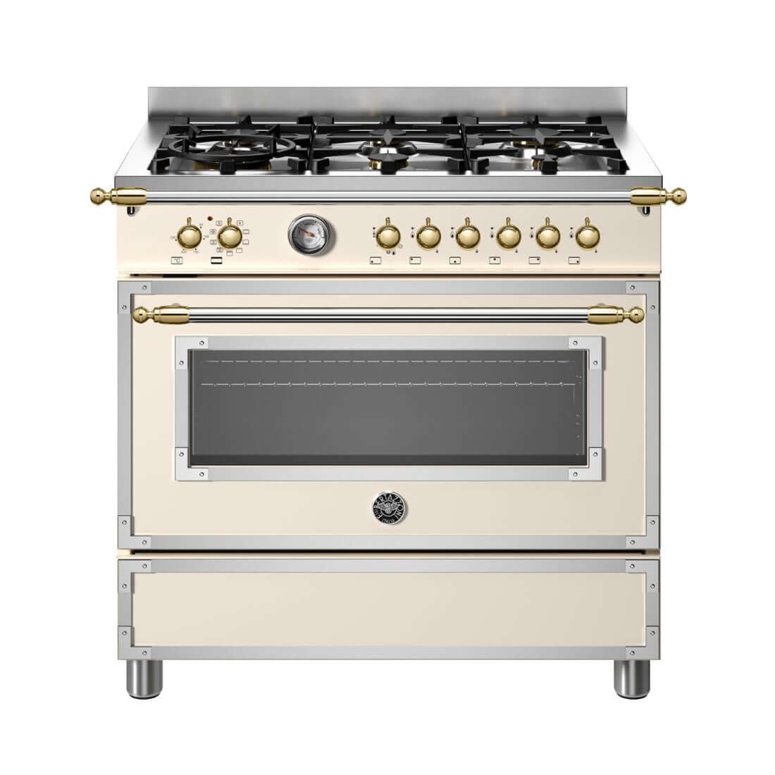 Fogão Bertazzoni Heritage Marfim 90cm 6 Bocas Forno Elétrico 103L fogão de piso marfim com painel dourado, grelhas ferro fundido e puxadores clássicos