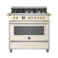 Fogão Bertazzoni Heritage Marfim 90cm 6 Bocas Forno Elétrico 103L fogão de piso marfim com painel dourado, grelhas ferro fundido e puxadores clássicos