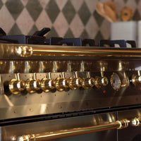 Fogão Lofra Dolcevita Inox 90cm 5 Bocas Forno Duplo Elétrico 106L: fogão de piso inox 5 bocas com botões dourados, puxadores e painel estilo profissional