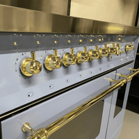 Fogão Lofra Dolcevita Lavanda 90cm 5 Bocas Forno Duplo Elétrico 106L - fogão de piso lavanda com acabamento inox e detalhes dourados, painel e puxadores elegantes