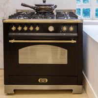 Fogão Lofra Dolcevita Preto 90cm 5 Bocas Forno Elétrico 102 Litros — fogão de piso preto fosco 5 bocas com botões dourados, forno elétrico e grelhas profissionais