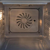 Forno Bertazzoni Heritage Elétrico a Vapor 76 Litros Inox 60cm mostrando interior inox com ventilador traseiro, prateleiras laterais e iluminação