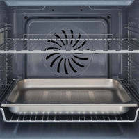 Forno Bertazzoni Heritage Elétrico a Vapor 76 Litros Inox 60cm mostrando interior inox com bandeja, grelhas e ventilador traseiro para embutir