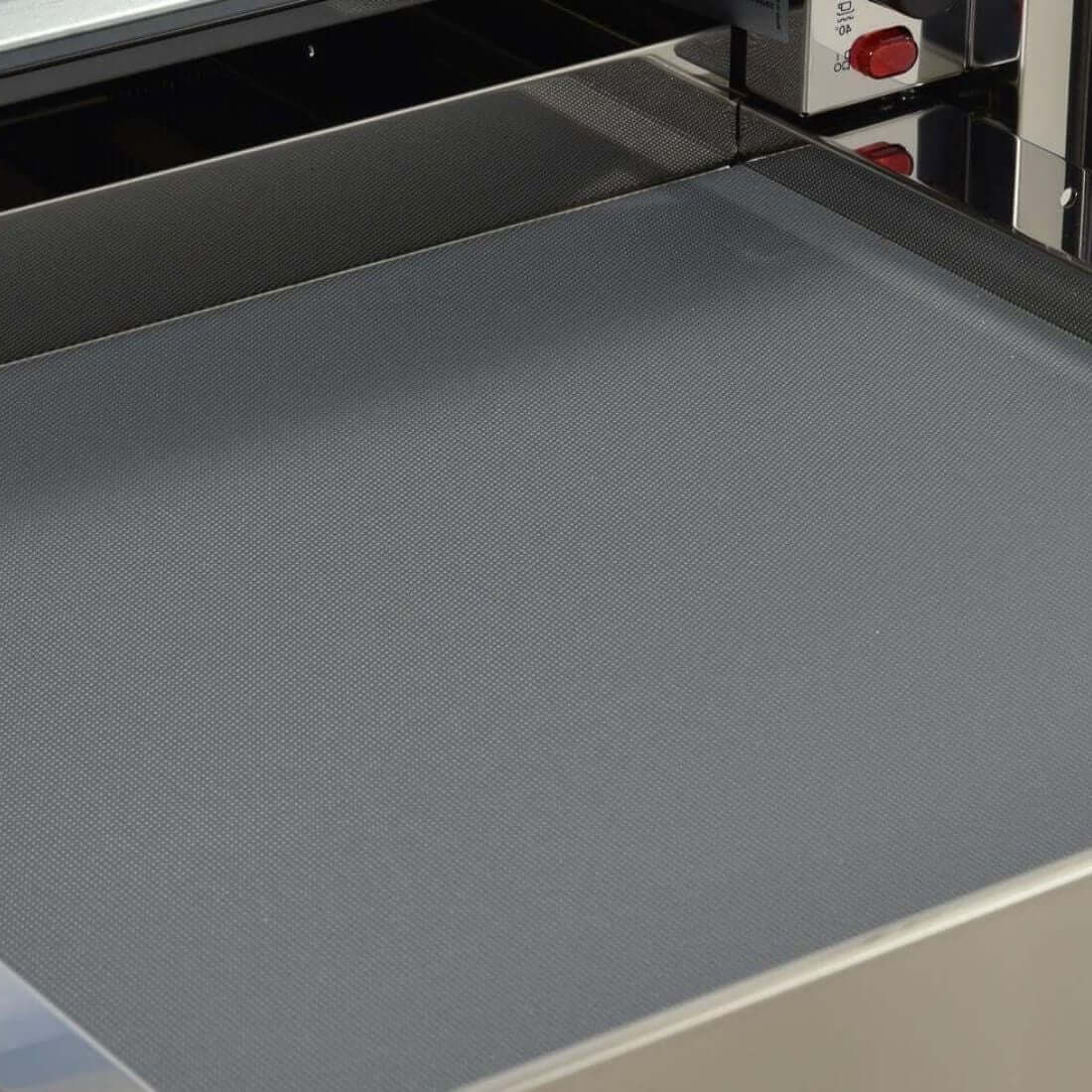 Gaveta Aquecida Bertazzoni Professional 4 Serviços Inox 60cm mostrando interior em inox escovado com frente embutir e painel touch com puxador discreto