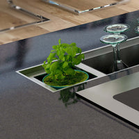 Porta Potes Mini Horta Debacco com ervas frescas em inox, ideal para organização de temperos na cozinha.