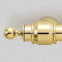 Terminais de cortina em metal dourado com design elegante e sofisticado.