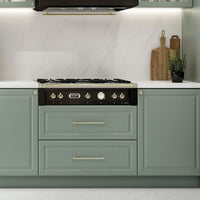 Rangetop Lofra Dolcevita 5 Bocas a Gás Preto 90cm em cozinha moderna com armários verdes e bancada branca.