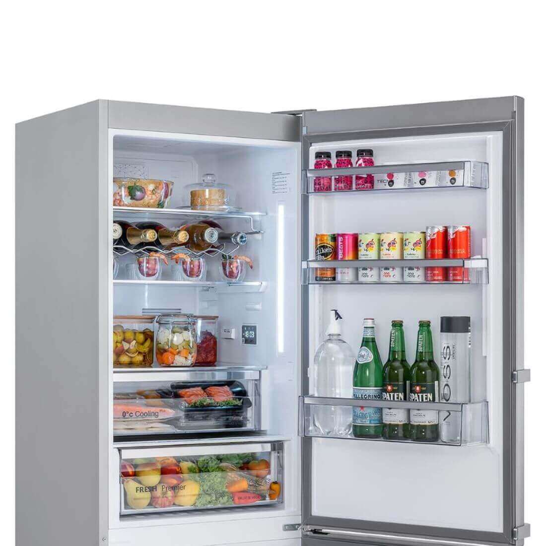 Refrigerador Tecno Vintage Bottom Freezer 324 Litros Inox 60cm com interior iluminado e organização eficiente.