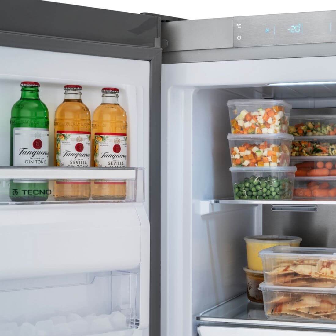 Interior do Freezer Tecno Vintage 278 Litros Inox 60cm com bebidas e alimentos armazenados.